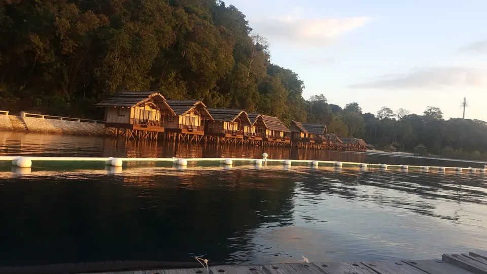 Wooden waterfront cottages at Pearl Farm Beach Resort, photographed in January 2020.